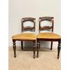 Coppia di sedie L. Filippo 1850, intagliate. Noce massello, mis h87, l46, p40 cm. 
