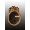 Specchiera ovale verticale stile Luigi XV del 1800 dorata foglia oro con bellissima cimasa