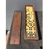 Box with dominoes in bone and ebony.     