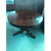 Extendable round table in walnut with central leg and 3 feet. Liguria.     