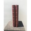 Box in the form of a pair of wooden books covered in leather with backgammon game inside.     