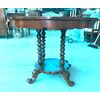 Walnut table with four legs and four feet, Louis Philippe period.     