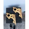 Pair of Appliques - eventual supports for shelves in carved wood and gold leaf.     