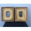 Pair of carved and gilded wooden frames with geometric and leaf motifs.     
