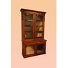 Antica bellissima libreria inglese in radica di noce con intagli e ante con specchio del 1800