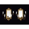 Pair of antique "Ventoline" mirrors, Napoleon III style, in gilded and chiseled bronze. France, 19th century.