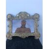 Cartagloria in wood with brass foil with tondo depicting Christ and Saints.     