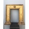 Support frame in carved and gilded wood with geometric motifs.     