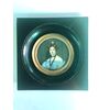 Miniatura con figura femminile.Cornice in legno ebanizzato.