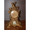 Orologio in bronzo del 1800 con medaglione in porcellana di sevres