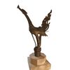 Scultura orientale raffigurante un cigno alato