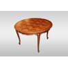 Tavolo provenzale circolare allungabile di inizio 1900 in legno di rovere con piano parquettato