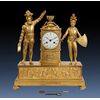 Orologio antico Impero Francese in bronzo dorato finemente cesellato. Periodo XIX secolo.