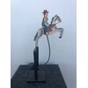 Modello-giocattolo in ferro  dipinto con contrappeso basculante   raffigurante uomo a cavallo.