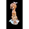 Figura di cane in porcellana con farfalla. Manifattura Cappe’.