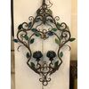 Pair of wrought iron chandeliers