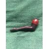 Pipa in legno e bakelite raffigurante gamba femminile.