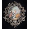 Placca dipinta a mano raffigurante scena galante con cornice in filigrana di argento. Roma XVIII secolo.