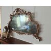 Specchiera orizzontale in legno dorato con fregi 