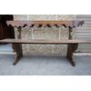 Restored 17th-century carved wooden bench