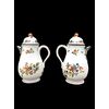 Pair of majolica coffee pots with floral decoration. Felice Clerici manufacture, Milan.