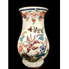 Trumpet-shaped majolica vase with floral motifs. Ferniani, Faenza.