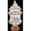Large majolica albarello mustard pot decorated with two soldiers and stylized rocaille and floral motifs. Marinoni manufacture, Angarano.
