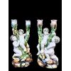 Pair of two-light majolica candlesticks with putti. Minghetti manufacture. Bologna.