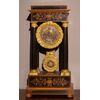 French Charles X style boxwood and ebonized wood table clock from the 1800s
