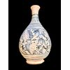 Majolica bottle with turquoise monochrome decoration depicting stylized plant motifs. Montelupo.