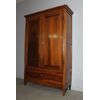 Antique walnut cabinet from the late 18th century. Restored. Simple and clean lines, two doors with hanging rod, lower drawer. Single non-removable body, truncated pyramidal legs with rounded upper frame. Simple and clean line.