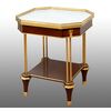 Tavolino antico ottagonale Napoleone III in mogano con innesti di elementi in bronzo dorato. Francia XIX secolo.