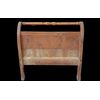 Solid walnut single boat bed with a turned top.