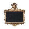 Carved and gilded wooden mirror. Italy, 18th century.