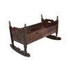 Carved wooden cradle. Italy, 19th century.