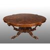 Antique English Victorian table in briar walnut with basket foot. Period 19th century.     