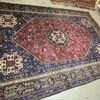 Antique Persian Ashfar rug 1930. Measures 266 x 180. In shades of red and blue.
