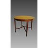 Round table in light wood four tapered legs