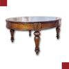TAVOLO OVALE IN NOCE CON INTAGLI META’ XIX SECOLO