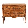 Venetian chest of drawers with two serpentine drawers.