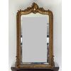 Carved gilded mirror, 19th century Lombardy. 145 x 83. Restored
