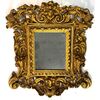Carved, sculpted, and gilded wooden mirror, Tuscany, early 18th century