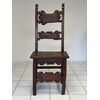 Luigi XIV walnut carved flap chair. Lombardy, 17th century.