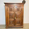 Antique wardrobe cabinet, 17th century Piedmont, paneled walnut doors. Dimensions: H 188 W 148 D 67 cm
