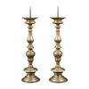 Coppia di candelieri ecclesiastici in bronzo dorato. Italia, XVII secolo.