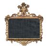 Carved and gilded wooden mirror. Italy, 18th century.