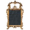 Carved and gilded wooden mirror. Italy, 18th century.