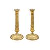 Coppia di candelieri in bronzo dorato. Parigi, inizi XIX secolo.