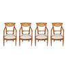 Four carved wooden armchairs. Italy, mid-19th century.