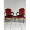 Pair of carved and gilded wooden armchairs. Lombardy, 19th century